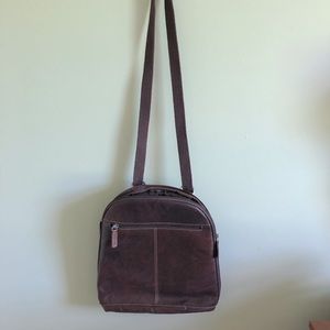 Genuine leather crossbody or back pack bag.